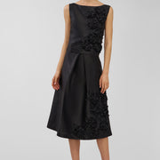 Black skirt with floral details on a white background